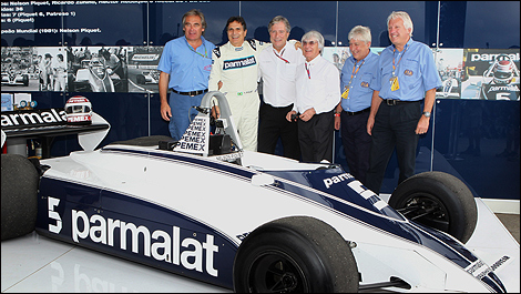 Past Brabham owner Bernie Ecclestone with Nelson Piquet, former team mechanics and the BT 49.