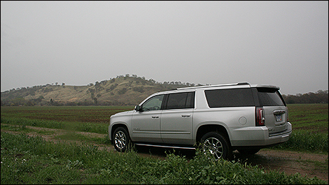 2015 GMC Yukon XL Denali rear 3/4 view