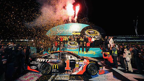 Jamie McMurray, driver of the #1 Bass Pro Chevrolet, celebrates in victory lane after winning the NASCAR Sprint Cup Series Sprint All-Star Race at Charlotte Motor Speedway on May 17, 2014 in Charlotte, North Carolina.