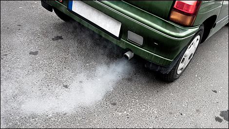 Car blowing out white smoke Car blowing out white smoke